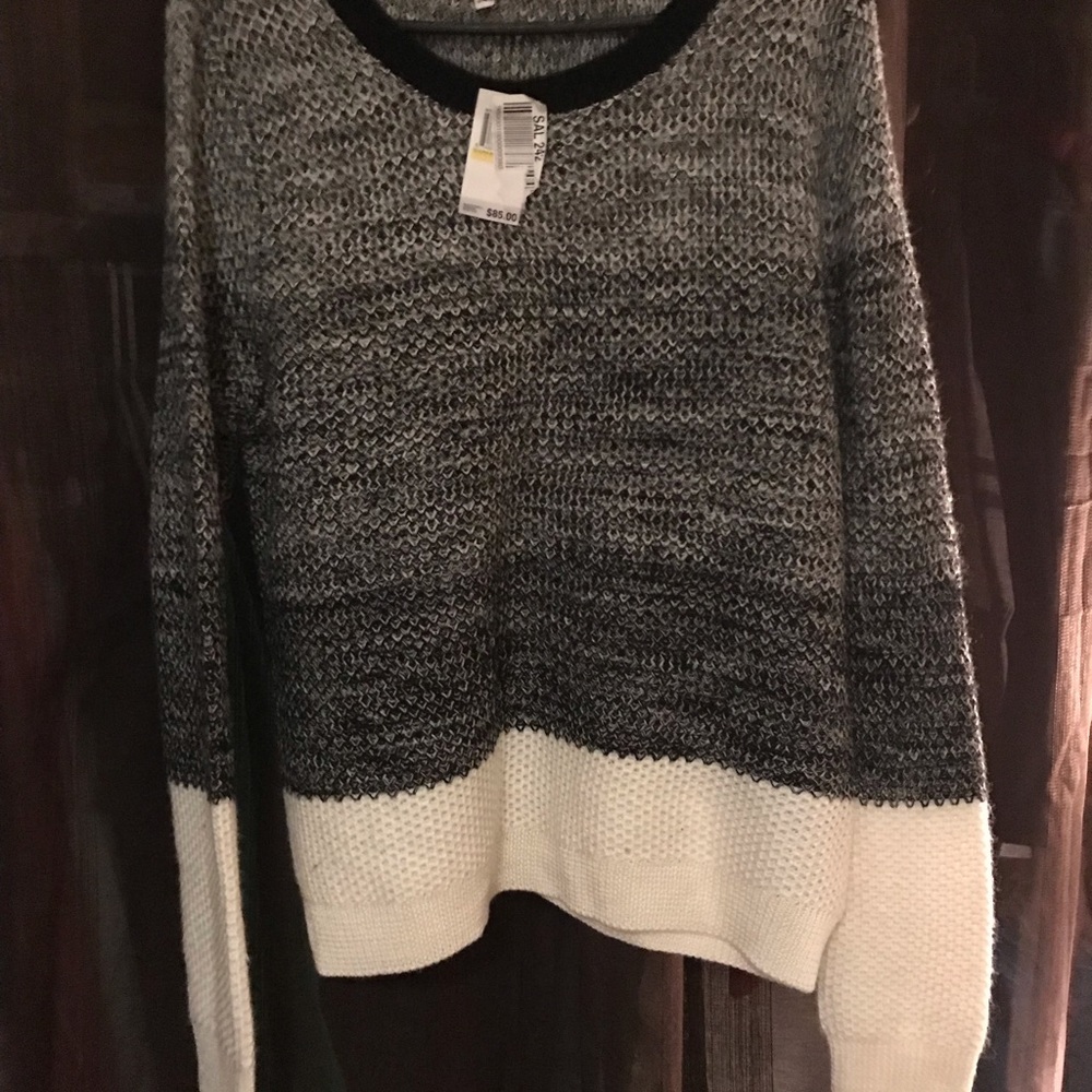 A beautiful sweater can be worn on a great day.